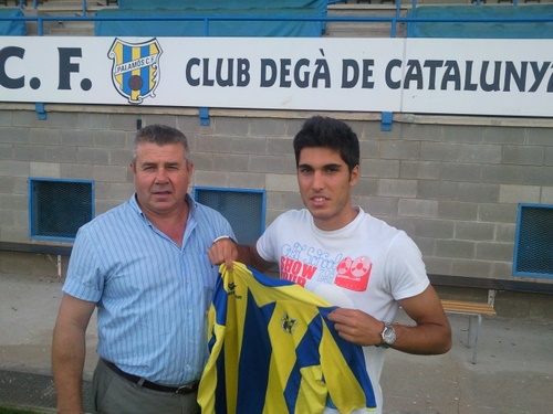 Sergi Romero al costat del president del Palamós CF, Miquel Aguilar.