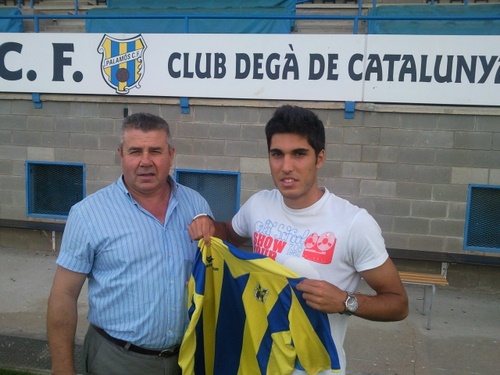 Sergi Romero, amb el president Miquel Aguilar, el dia de la seva presentació.