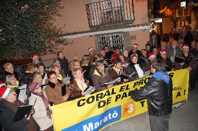 La coral El Progrés cantant per a la Marató de TV3, en una imatge d'arxiu.