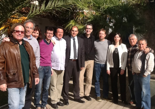 Foto de grup entre directius del Palamós CF i membres de Fecotur.
