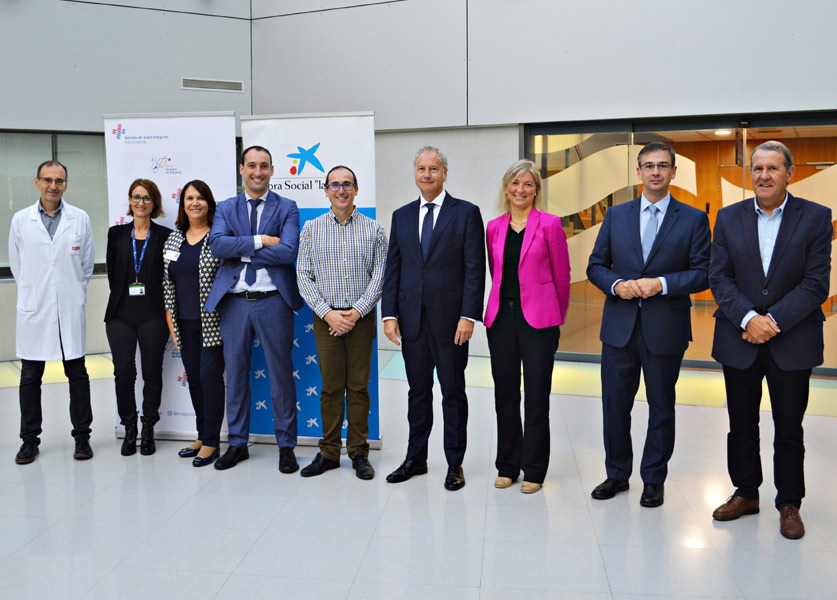 Representants de La Caixa i SSIBE durant la presentació del conveni, la setmana passada. (Foto: SSIBE).